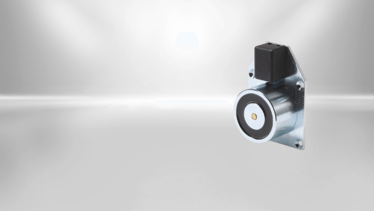 Door holding magnet SAFE (with plate and clamp) from Kendrion Door holding magnets from Kendrion are available in different designs. This type of SAFE Line is staffed with a steel mounting plate and a two-pole terminal clamp.